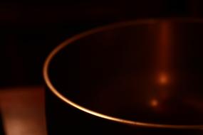 Bowl Tibetan Circular close-up in dark blurred background
