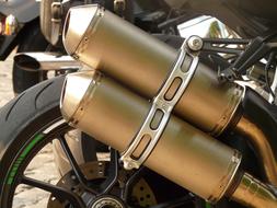 macro photo of motorcycle exhaust pipe