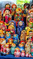 Colorful and beautiful, shiny Russian Dolls, on the stand