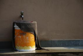bucket, cloth and tap water