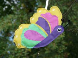 colorful butterfly as decoration in the garden