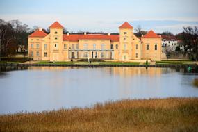 Rheinsberg Palace on lakeshore at fall, germany