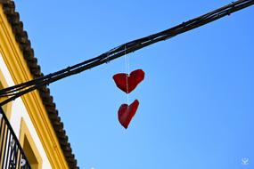 Hearts Two Red and blue sky