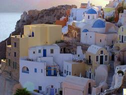 Beautiful landscape of Santorini, with the colorful buildings, in sunlight, in Greece