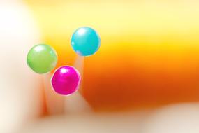 close up view of colorful pins