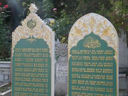 gravestones with inscriptions in a cemetery in turkey