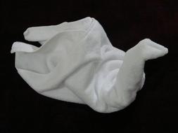 folded swan-shaped towel on black background