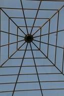 Low angle shot of the beautiful architecture with lines, at blue sky on background