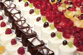 variety of fruit cakes on the counter