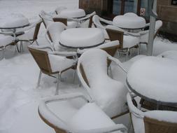 outdoor cafe furniture in the snow