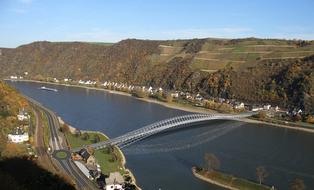 Beautiful landscape with the Middle Rhine Bridge, among the colorful hills in Germany, at blue sky on background