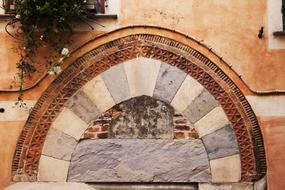 antique entrance arch on the facade