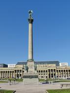 Beautiful pillar with the angel, at blue sky on background, in Stuttgart, Germany