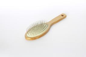 Hair brush with wooden handle