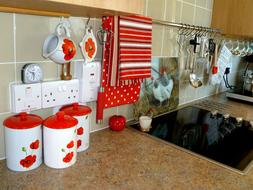 Colorful, patterned crockery in the kitchen, above the table