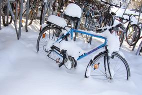 Snowy, blue bike, among the snow, in the winter