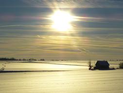 house among the fields in winter