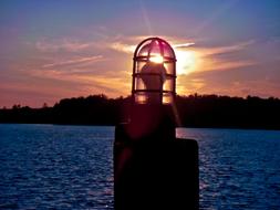 lantern on the river at dusk