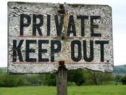 inscription on the fence in the countryside