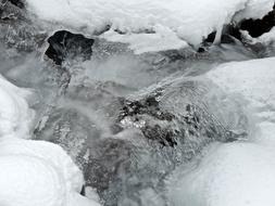 Waterflow beneath snow and ice