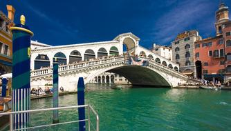 Rialto bridge in Venice on a sunny day