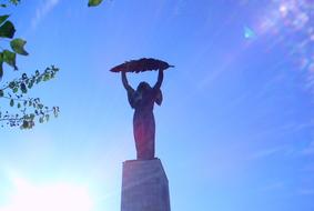 statue in budapest in bright sunshine