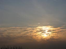 Clouds and sun on sky