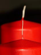 red candle, white wick