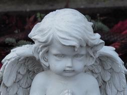 Cute, white statue of angel