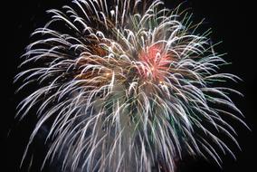 White and Red Fireworks at night
