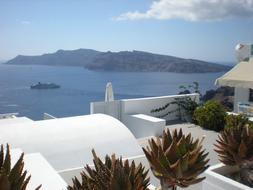 panoramic view of the sunny coast of santorini island