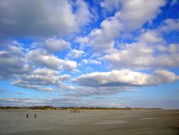 sky in white clouds over desert landscape