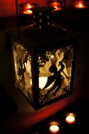 silhouette of an angel on a decorative lantern