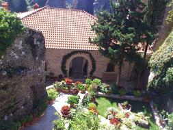 Meteora Greek rock with flowers