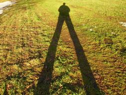 Shadow Photographer on field