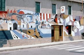 Colorful and beautiful graffiti with shapes in Sardinia, Italy