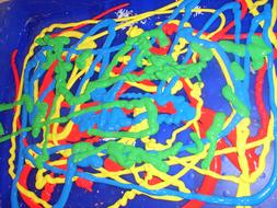 Close-up of the colorful shapes on the blue surface