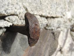 metal fasteners in the wall