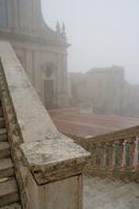 Beautiful architecture in Caltagirone, Sicily, Italy, in fog