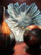 abstract still life, brown bottle and ball