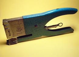 old Paperclip Stapler in Office