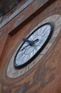 dial on old clock tower close up