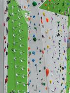 Green and grey climbing walls with colorful step treads and step ladder