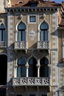facade with balconies of a historic building in Venice