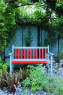 red bench in the garden