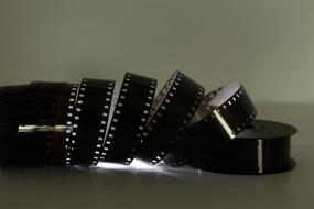 Close-up of the rolled 8 mm film with low-light