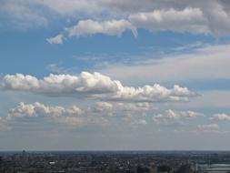 Clouds over big city at Spring