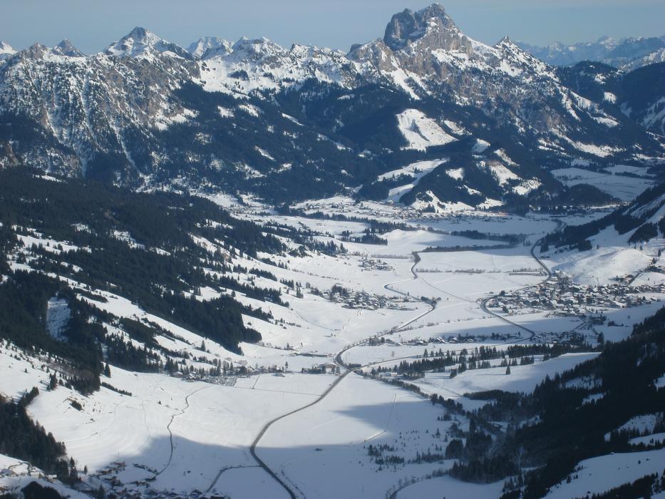 snow panorama of the tannheimertal valley in the Alps