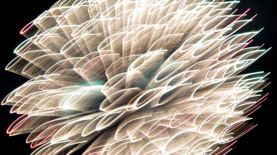 Colorful, shiny fireworks in the pattern, on the Independence Day, at the night
