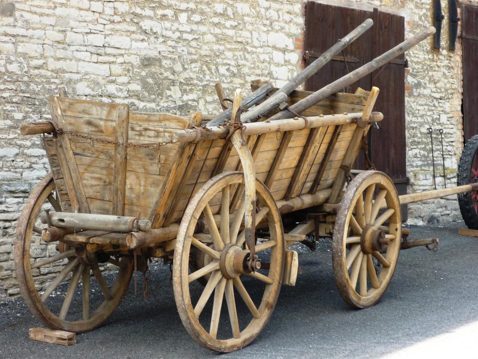 wooden cart near the building